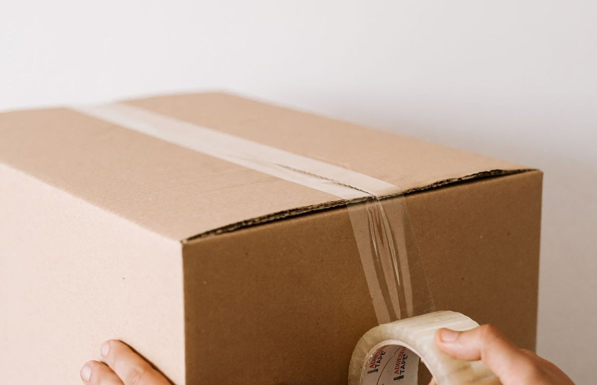 A carton being sealed before dispatch