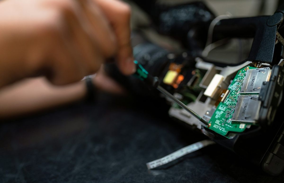 An incoming part examined by hand